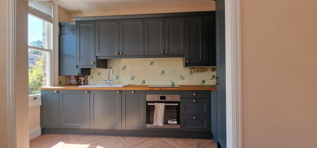 Fitted dark kitchen units and bespoke carpentry in Brentwood