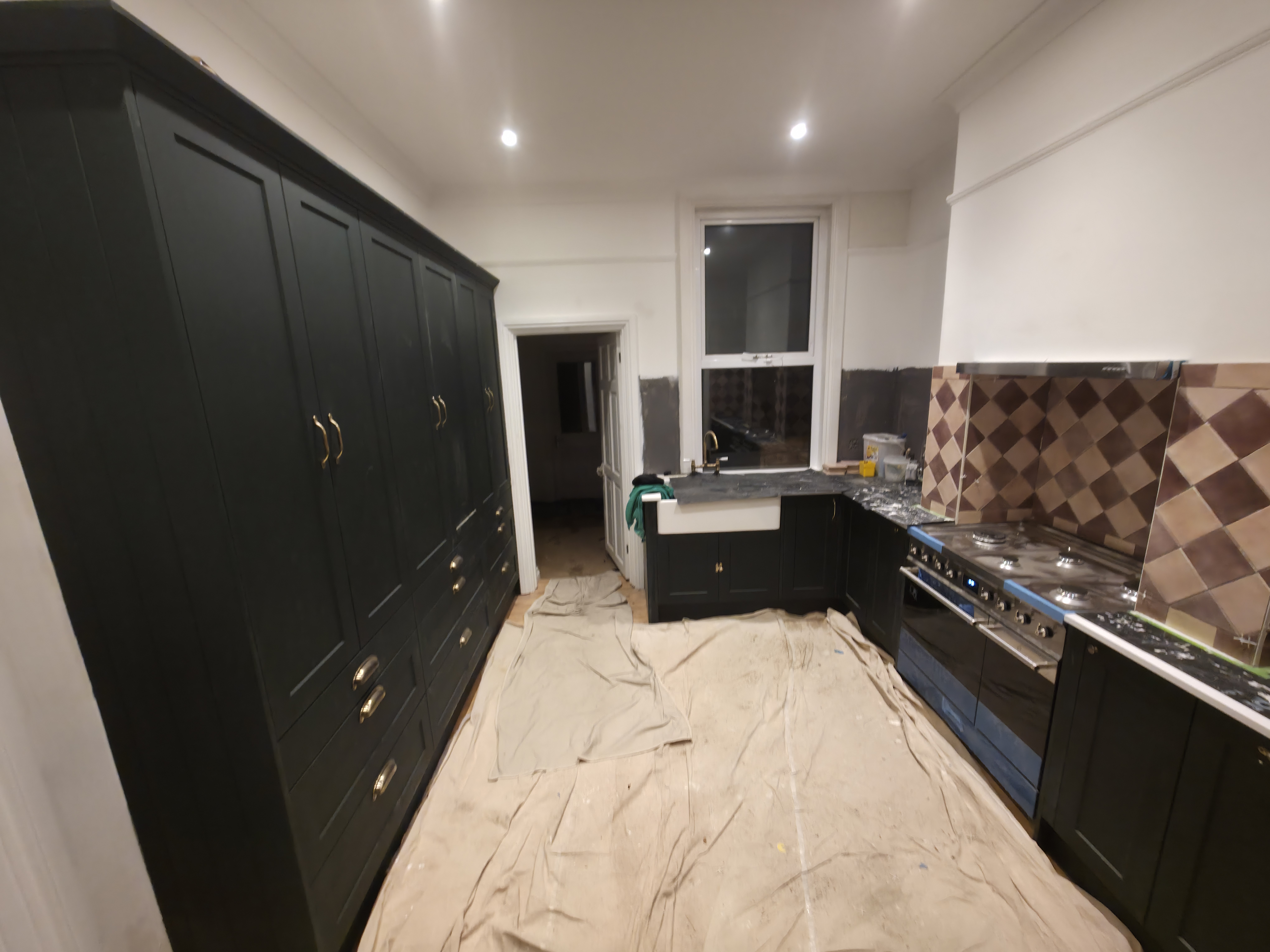 Modern dark kitchen units and high-end cabinetry in Chigwell