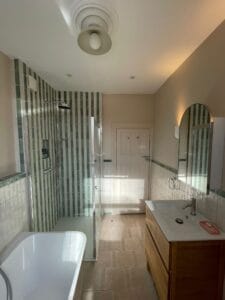 Luxury bathroom renovation featuring a freestanding bathtub