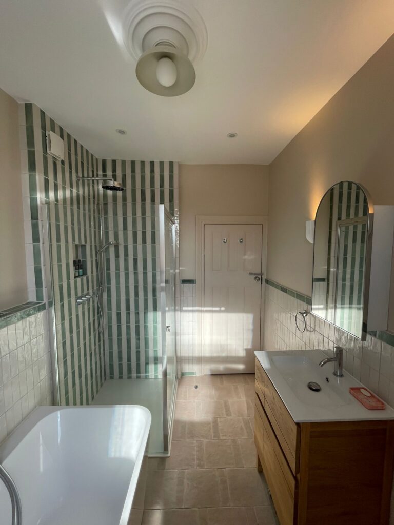 Luxury bathroom renovation featuring a freestanding bathtub