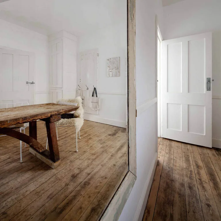Solid wood flooring sanding and installation in residential property